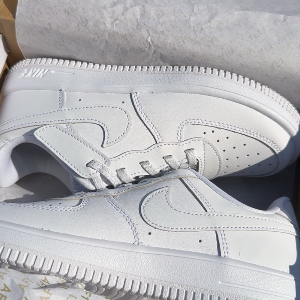 Nike Women’s White Low-Top Leather Sneakers